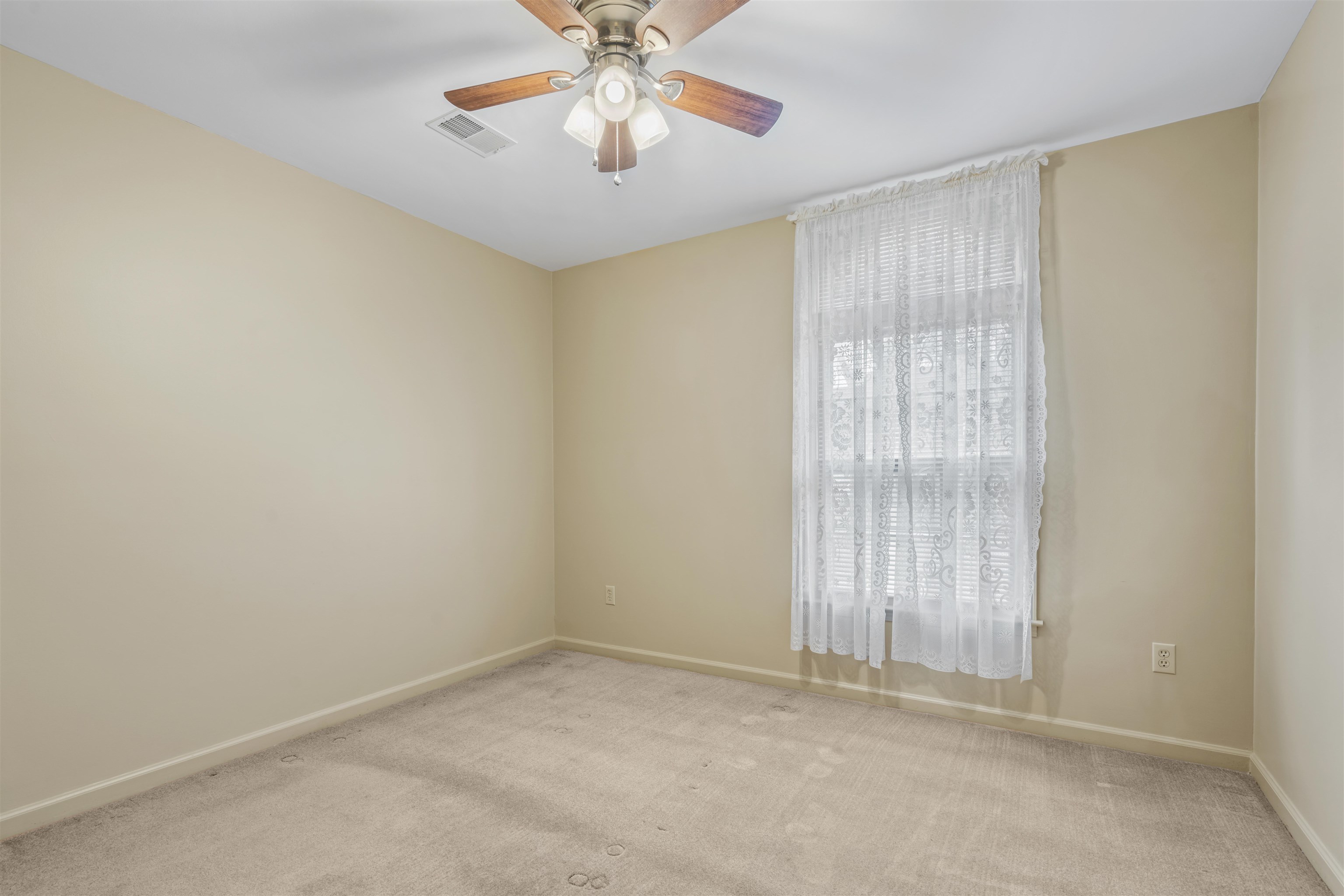 7087 Cutter Mill Road Memphis, TN 38141 - Photo 11 of 20 Bedroom with smooth ceiling, ceiling fan & neutral carpet & fresh paint.
