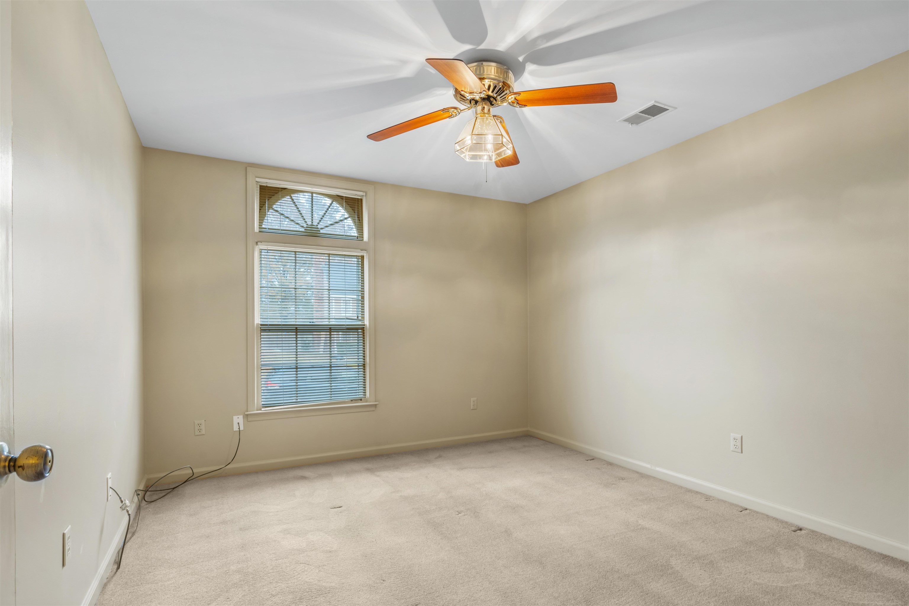 7087 Cutter Mill Road Memphis, TN 38141 - Photo 12 of 20 Bedroom with smooth ceiling, ceiling fan & neutral carpet & fresh paint.