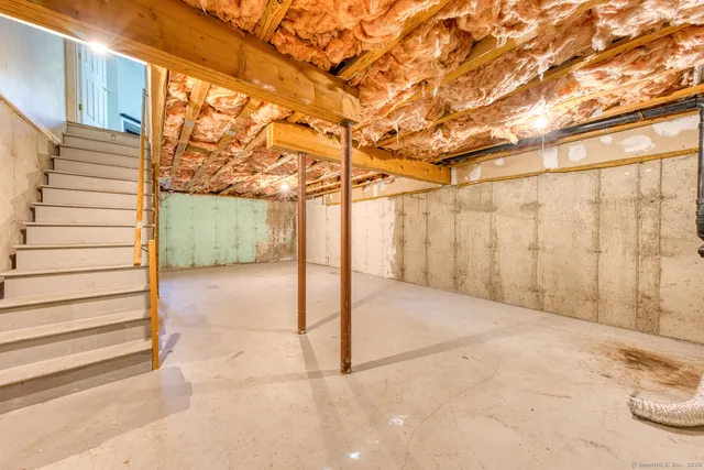 a view of a big room with wooden fence