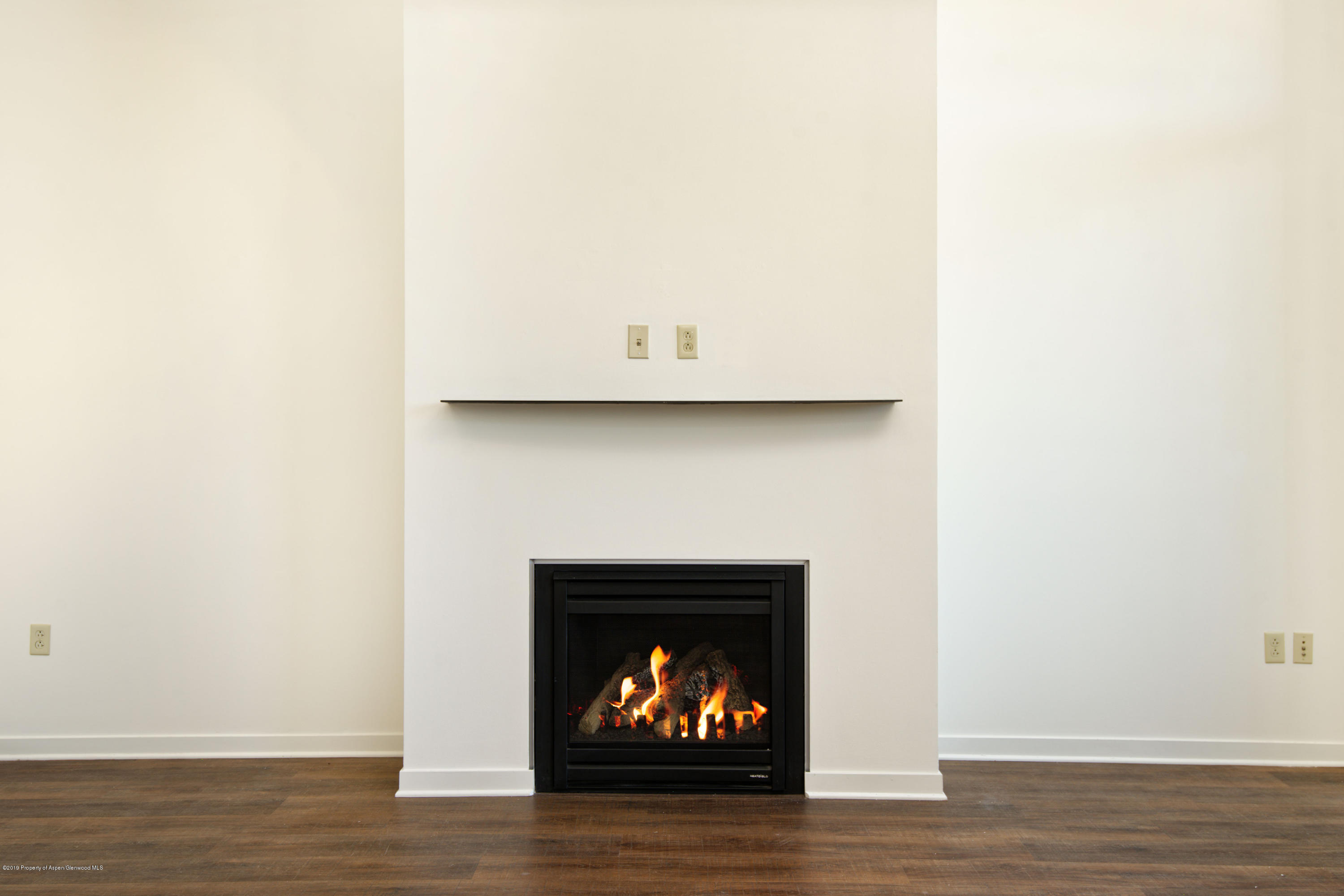 361 Robinson Street, Unit 202 Basalt, CO 81621 - Photo 11 of 29 a room with a fireplace