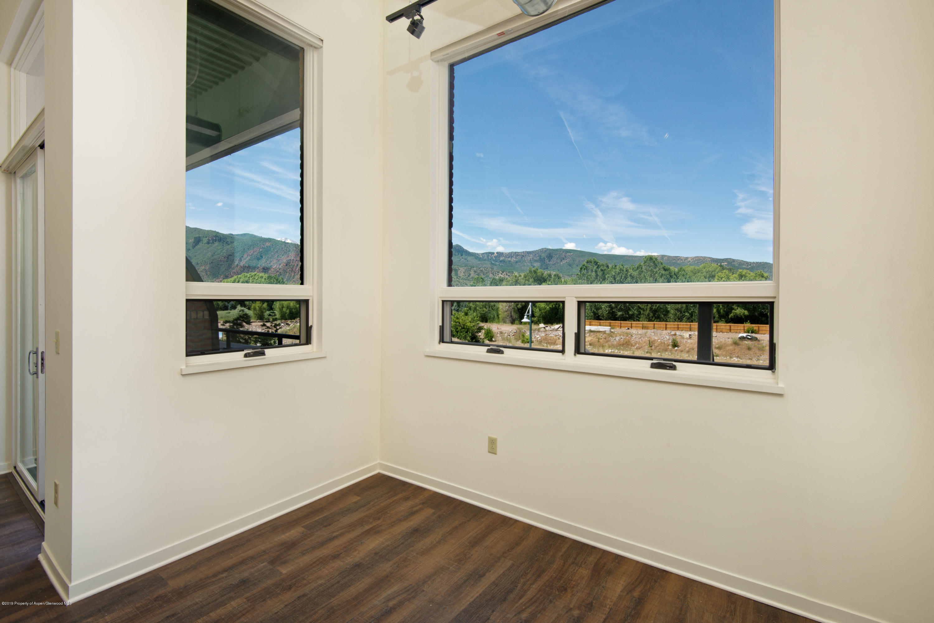 361 Robinson Street, Unit 202 Basalt, CO 81621 - Photo 12 of 29 an empty room with a window