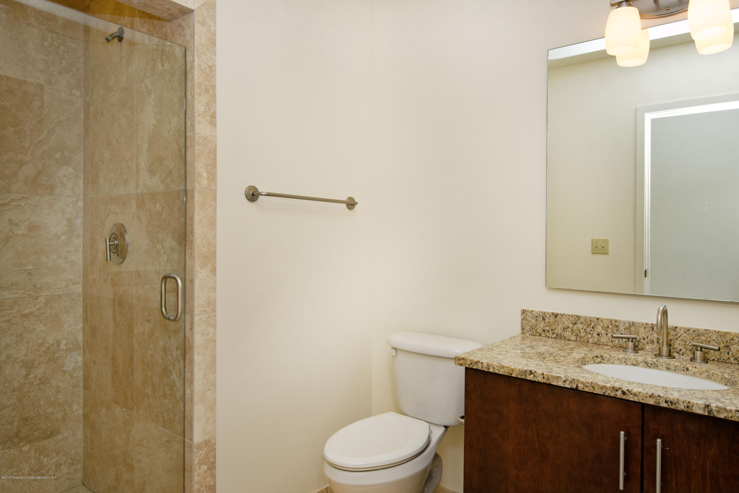 361 Robinson Street, Unit 202 Basalt, CO 81621 - Photo 13 of 29 a bathroom with a granite countertop sink toilet and shower