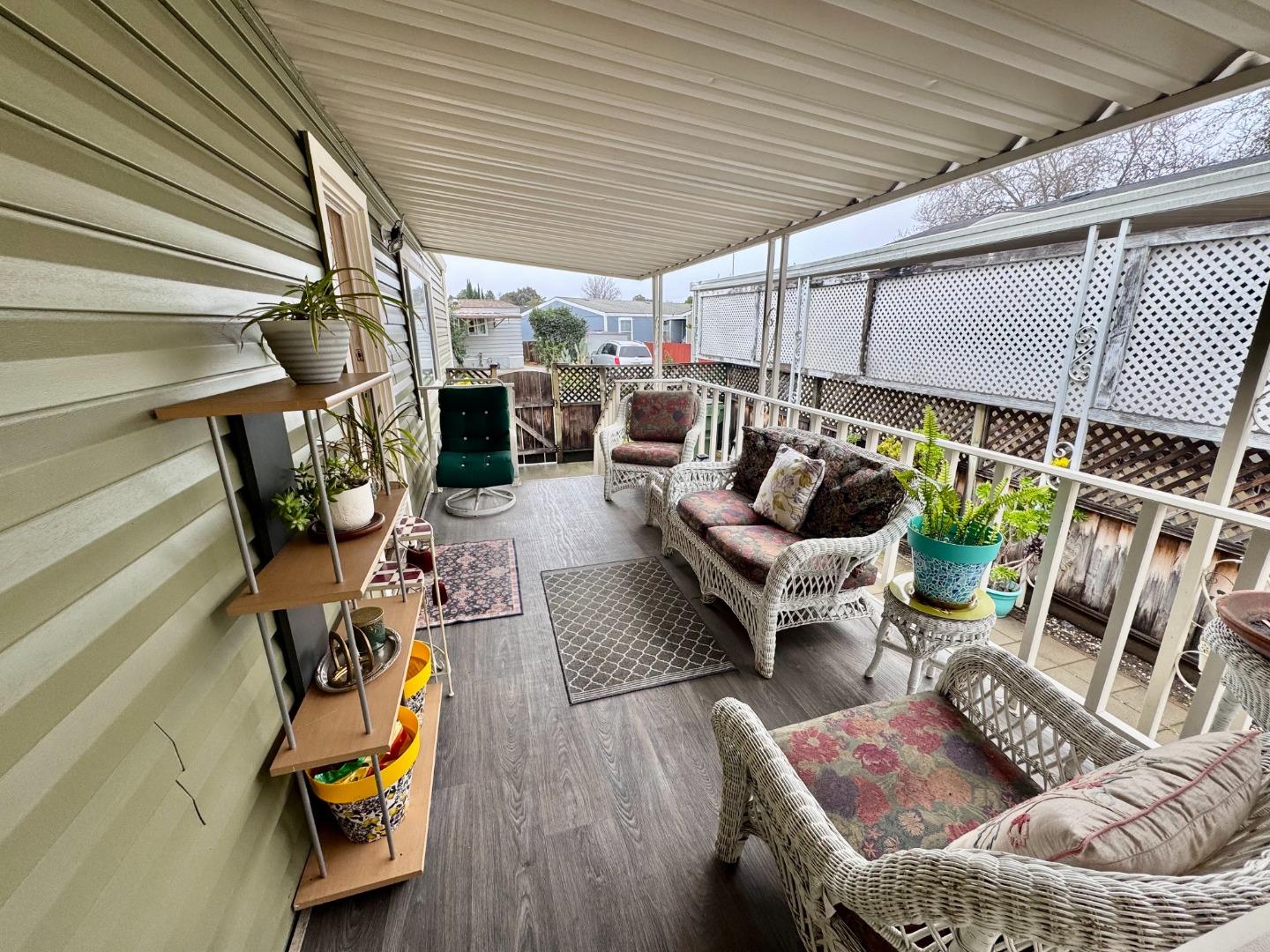 2151 Oakland Road, Unit 22 San Jose, CA 95131 - Photo 11 of 12 a view of an outdoor sitting area with furniture and rug
