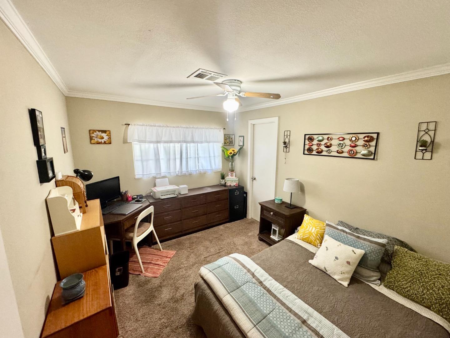 2151 Oakland Road, Unit 22 San Jose, CA 95131 - Photo 6 of 12 a bedroom with furniture and a window