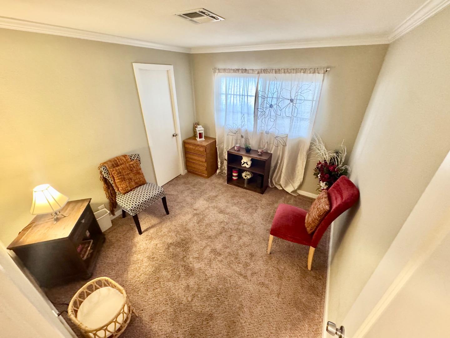 2151 Oakland Road, Unit 22 San Jose, CA 95131 - Photo 7 of 12 a living room with furniture and a window