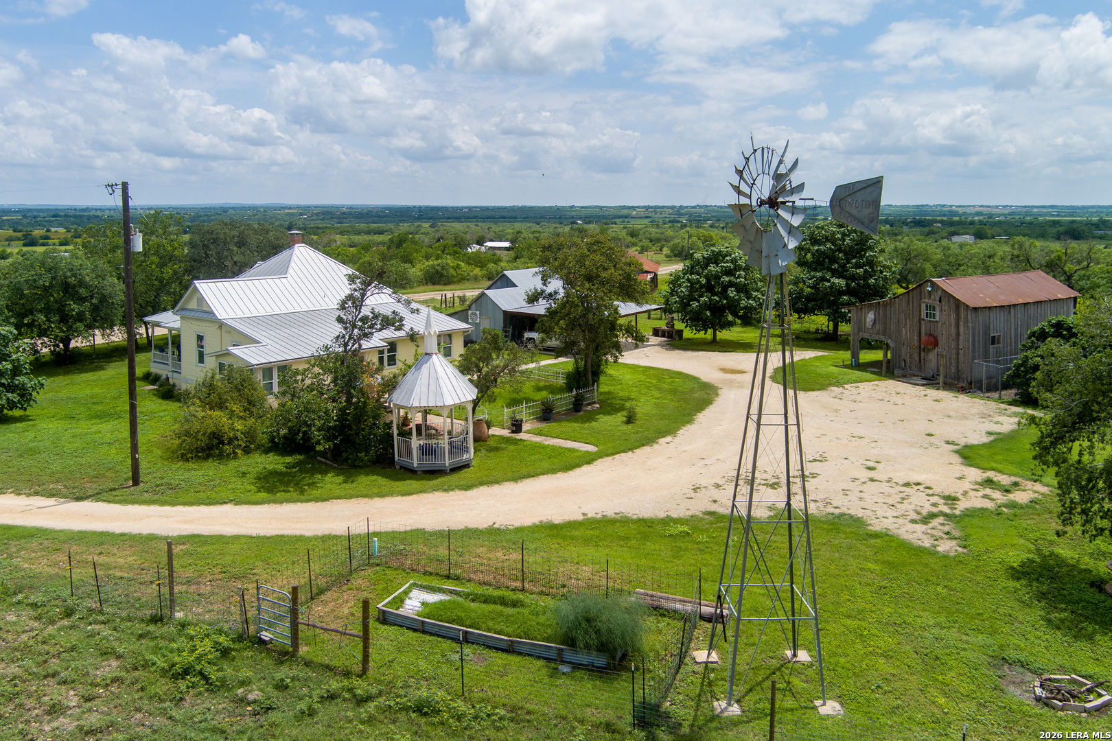 4515 Stapper Road St. Hedwig, TX 78152 - Photo 60 of 64 an aerial view of a house with backyard space and lake view
