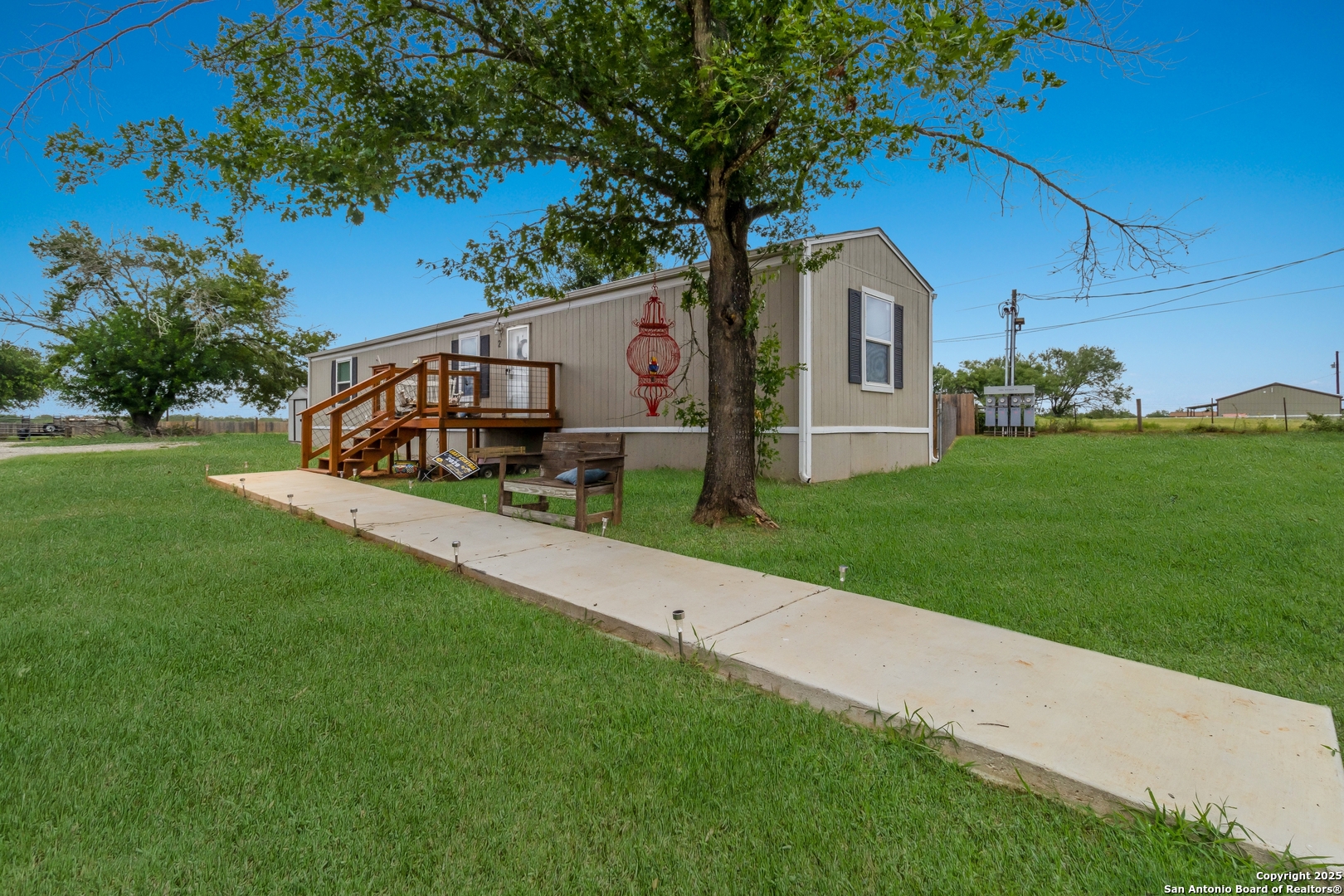 a house view with a garden space