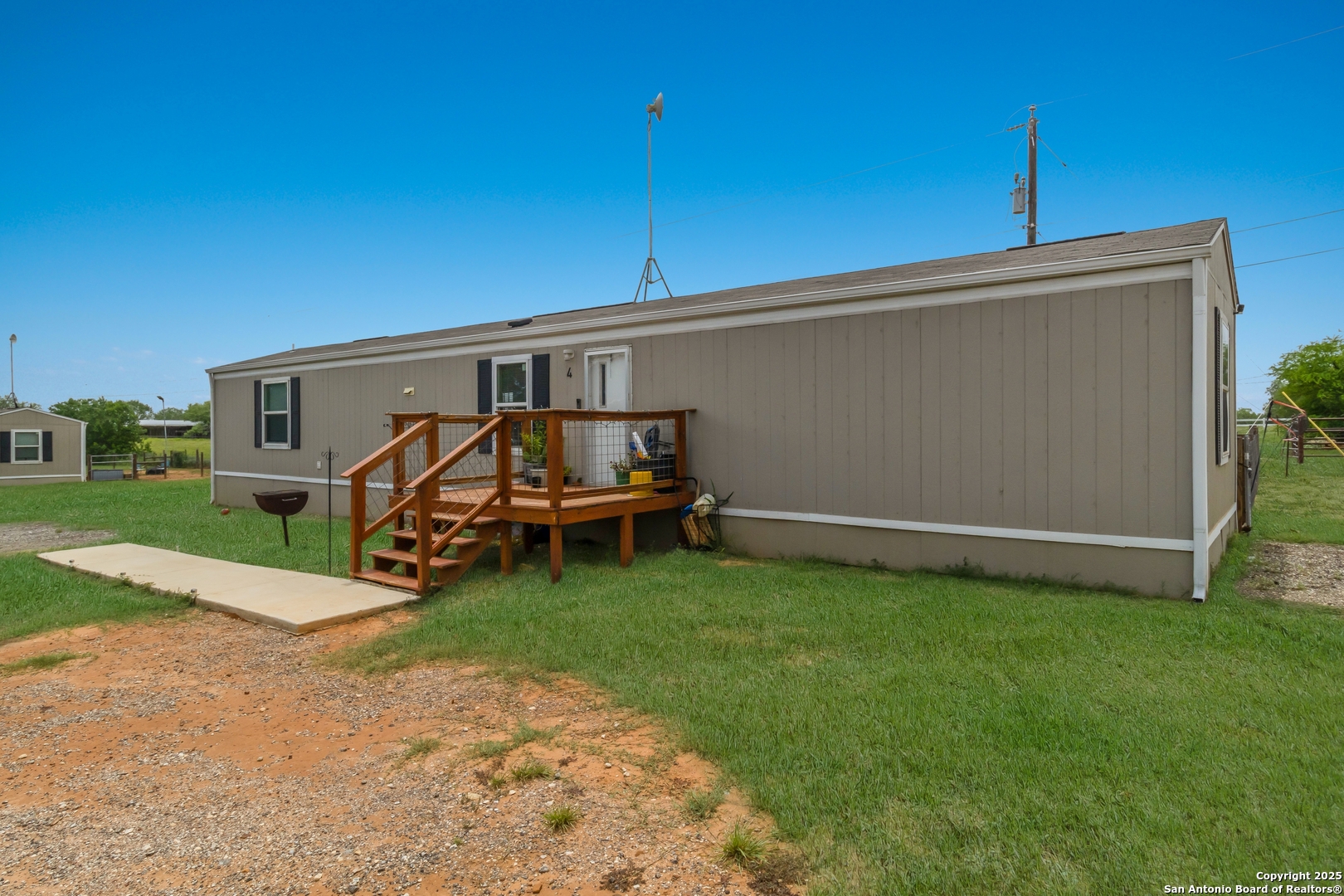 7380 Pittman Road Adkins, TX 78101 - Photo 4 of 16 a view of a patio with a yard