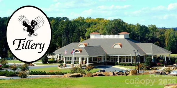 an aerial view of a house roof deck with couches table and chairs