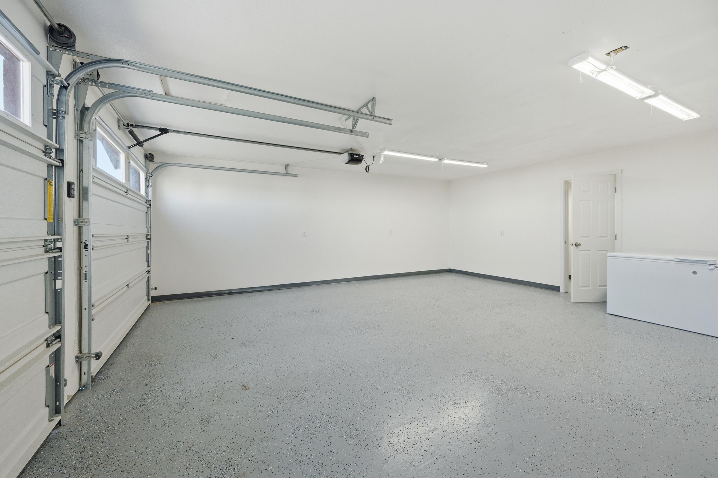 4074 Southwest Reif Road Powell Butte, OR 97753 - Photo 29 of 59 a view of a room with racks on the wall