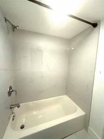 a bathroom with a tub