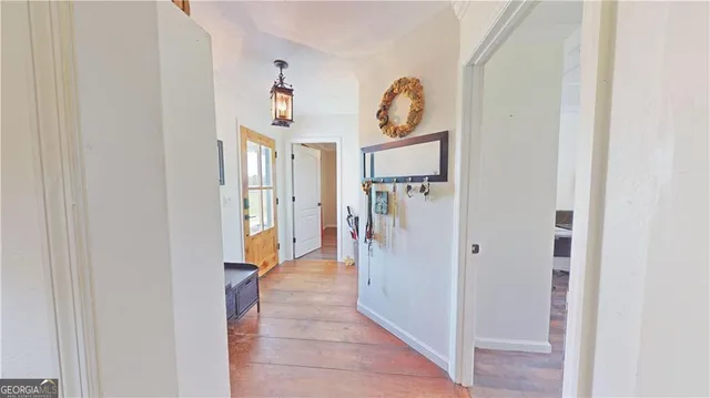 a kitchen with stainless steel appliances sink cabinets and window