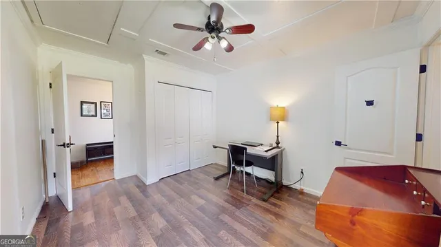 a view of a field with an ocean