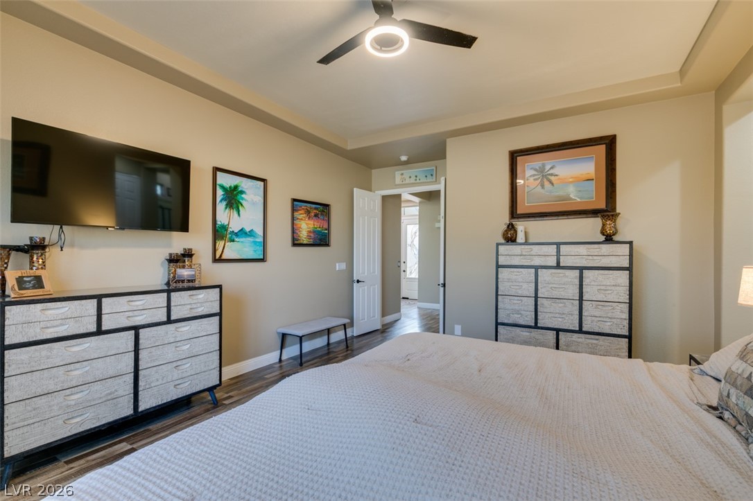 7524 Midnight Rambler Street Las Vegas, NV 89149 - Photo 38 of 51 Recessed lighting and a modern ceiling fan illuminate this inviting primary bedroom.