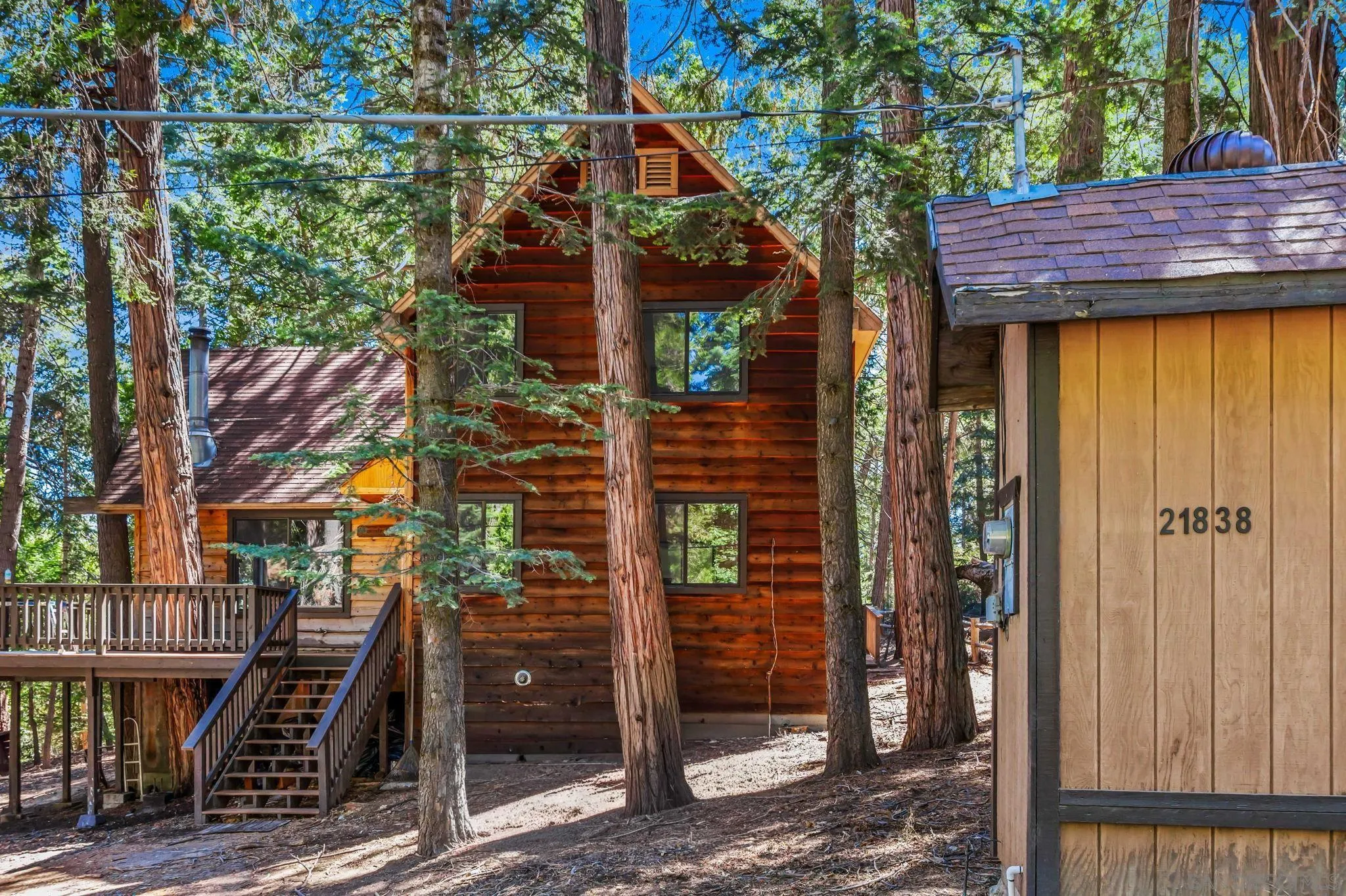 21838 Crestline Road Palomar Mountain, CA 92060 - Photo 17 of 26 a view of a house with a tree