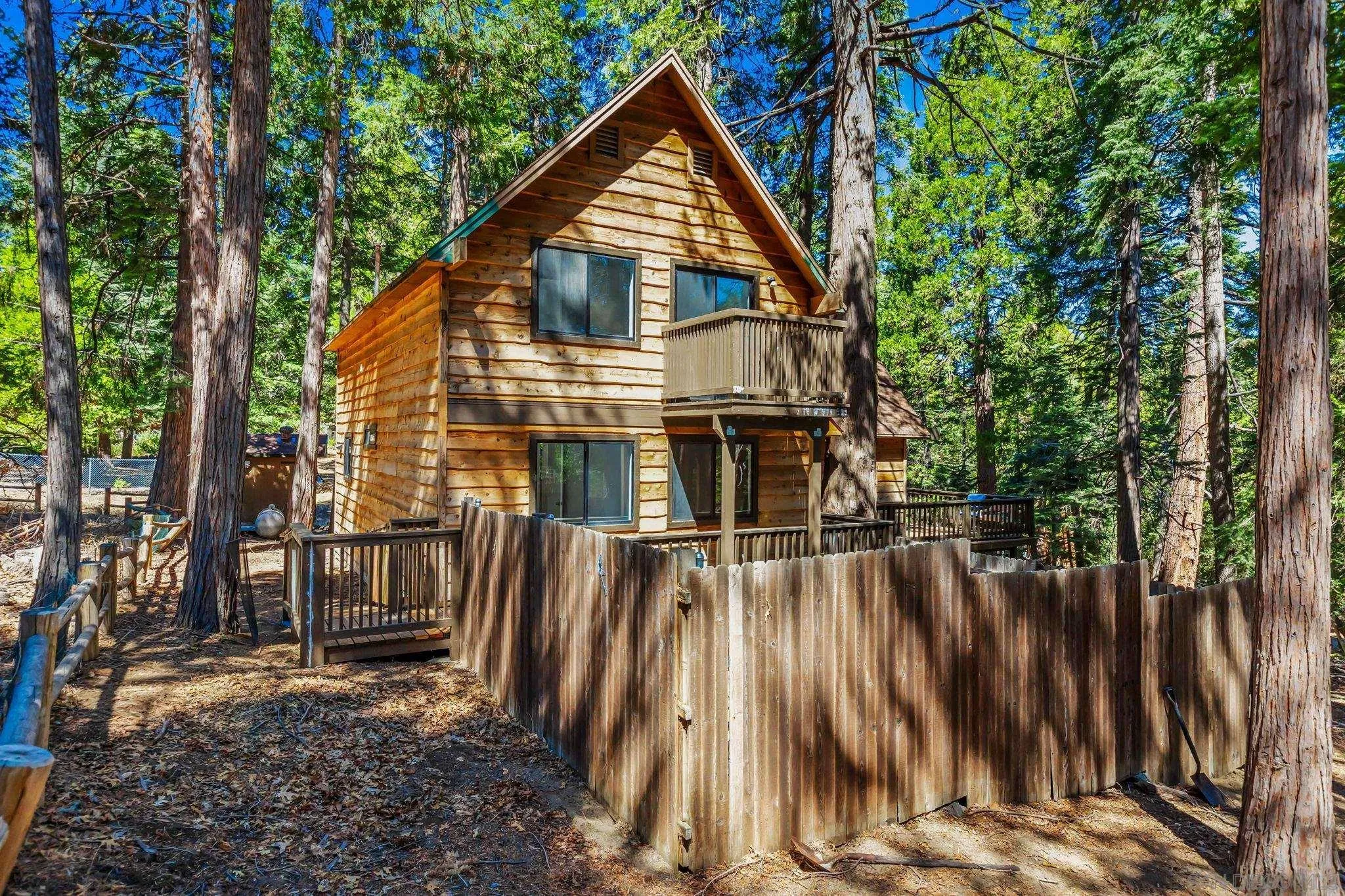21838 Crestline Road Palomar Mountain, CA 92060 - Photo 19 of 26 a view of house with backyard and trees