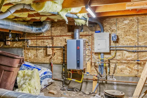 a utility room with multiple dryer and washer