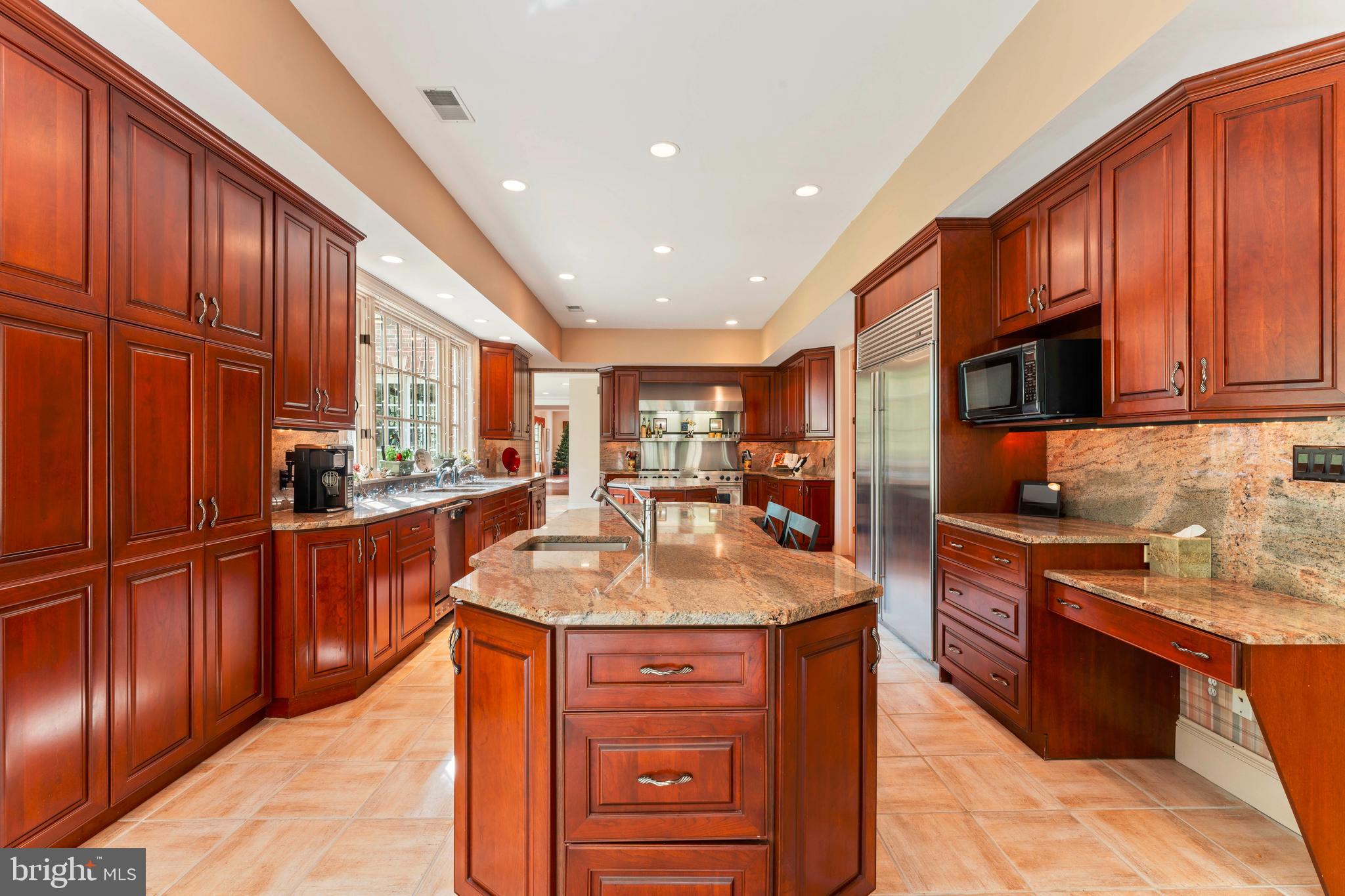 1390 Old Jacksonville Road Ivyland, PA 18974 - Photo 14 of 75 a kitchen with stainless steel appliances granite countertop a sink stove and refrigerator