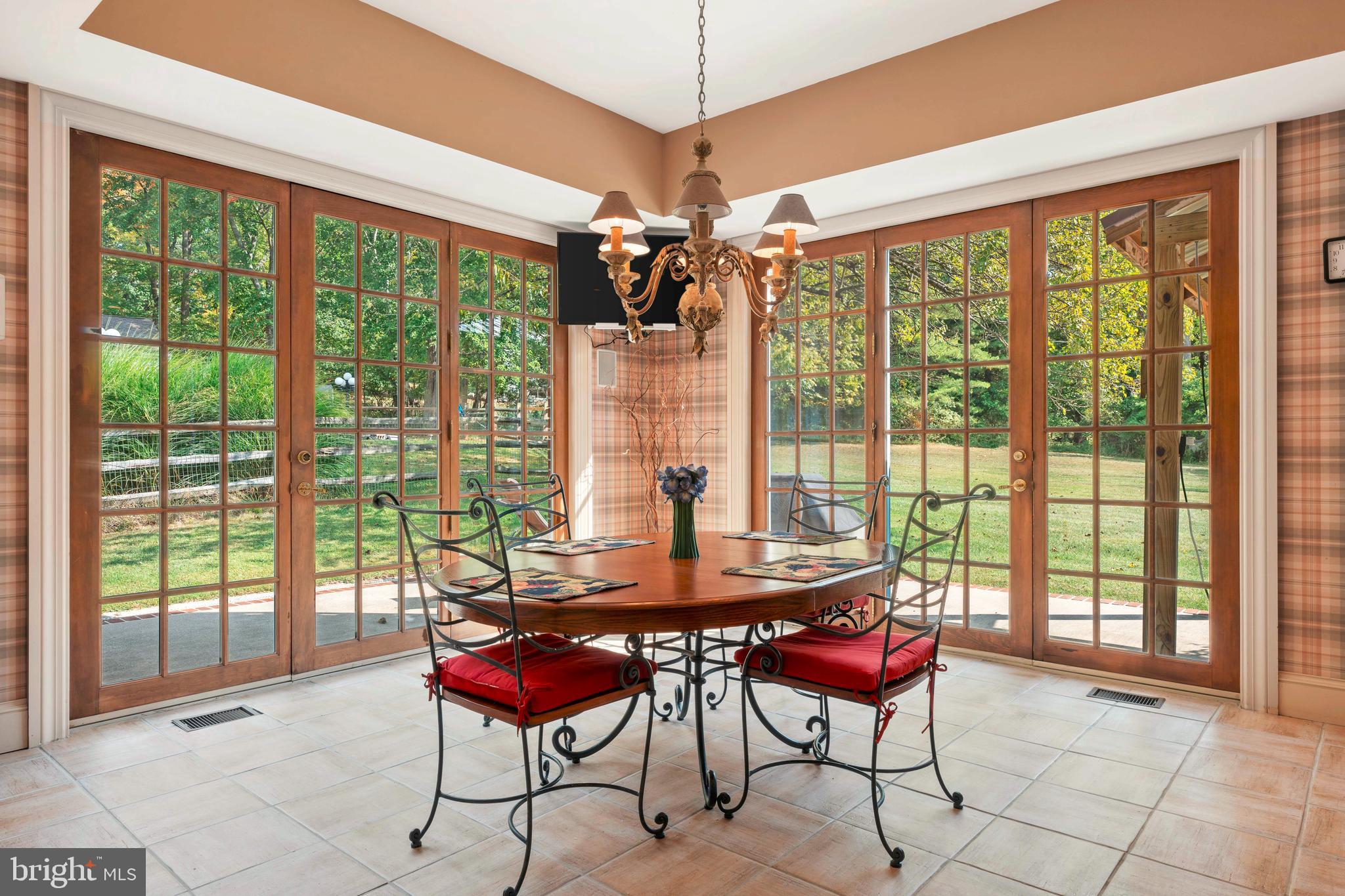 1390 Old Jacksonville Road Ivyland, PA 18974 - Photo 17 of 75 a living room with furniture and a floor to ceiling window
