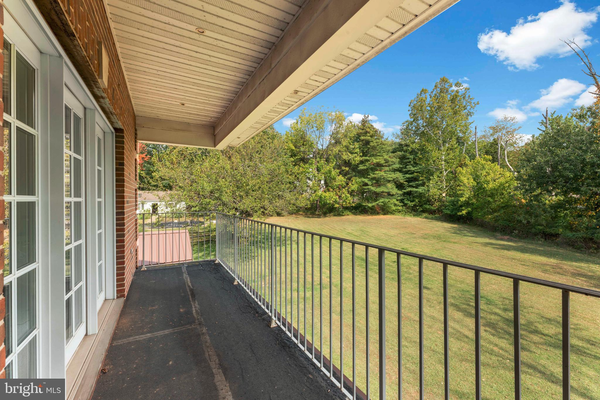 1390 Old Jacksonville Road Ivyland, PA 18974 - Photo 34 of 75 a view of a balcony with trees