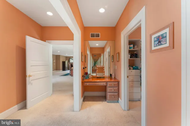 a large spacious bathroom with a large tub and sink