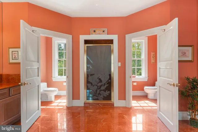 a bedroom with a bed and dresser