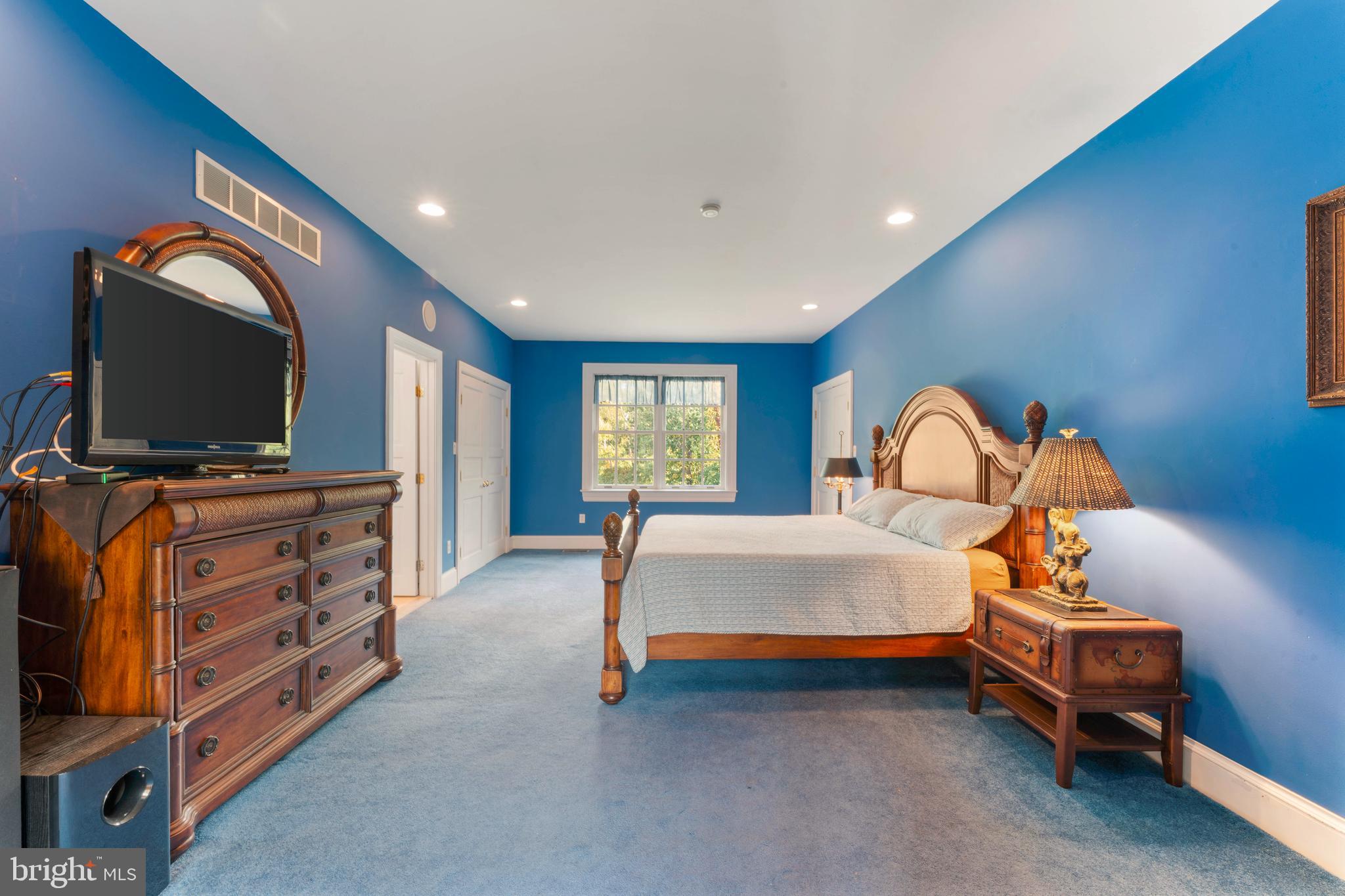 1390 Old Jacksonville Road Ivyland, PA 18974 - Photo 43 of 75 a bedroom with bed and a flat tv screen on dresser