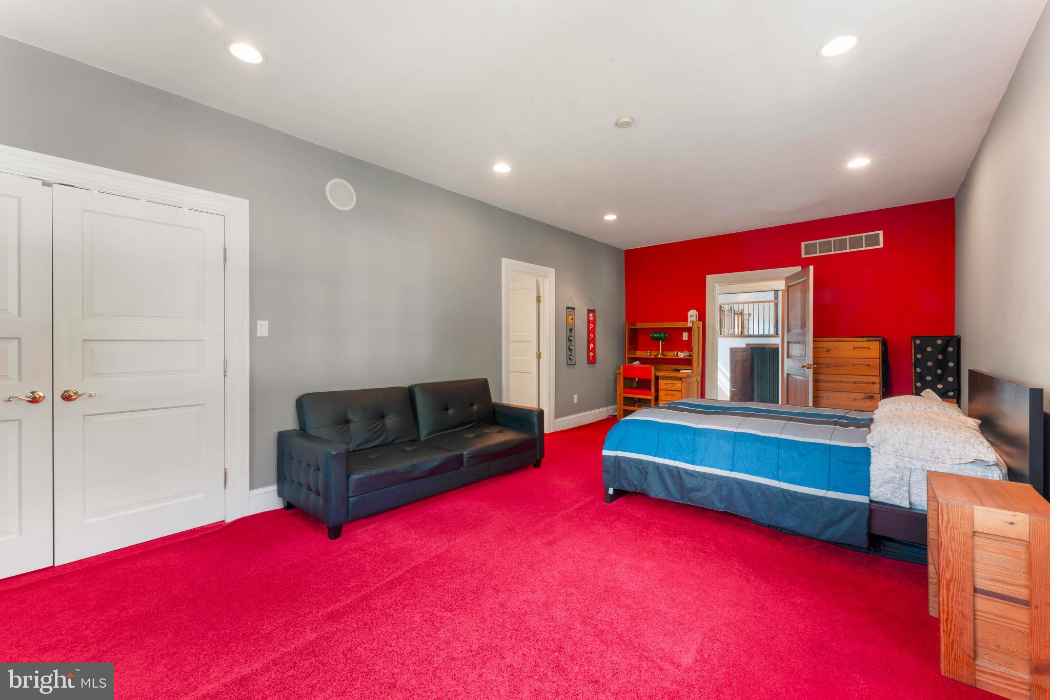 1390 Old Jacksonville Road Ivyland, PA 18974 - Photo 46 of 75 a spacious bedroom with a bed and a couch