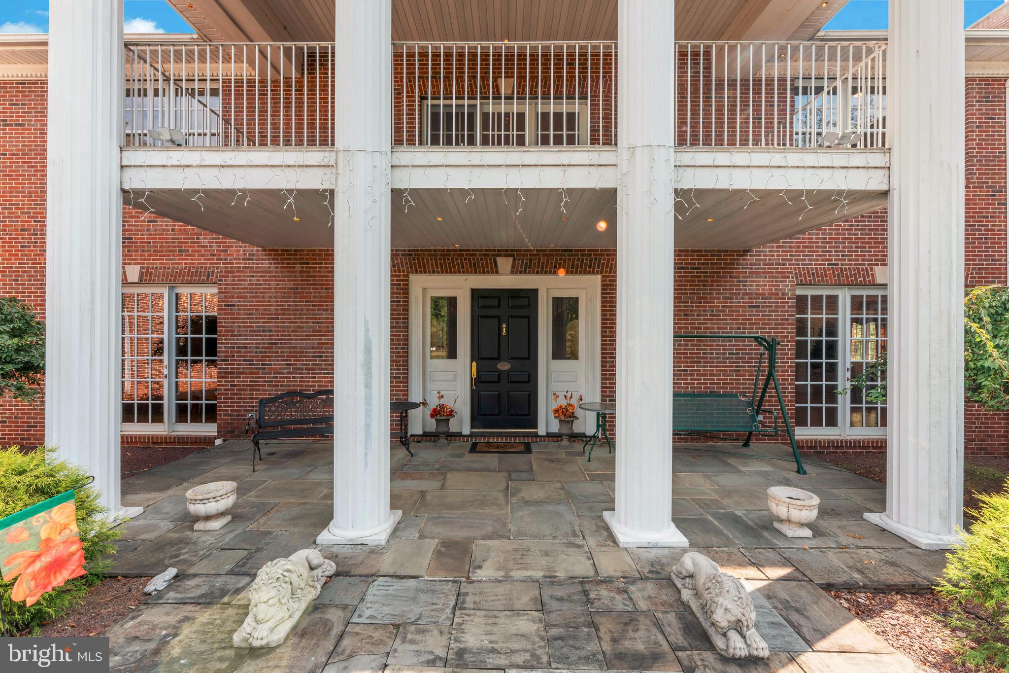 1390 Old Jacksonville Road Ivyland, PA 18974 - Photo 61 of 75 a view of a building with a bench in front of building