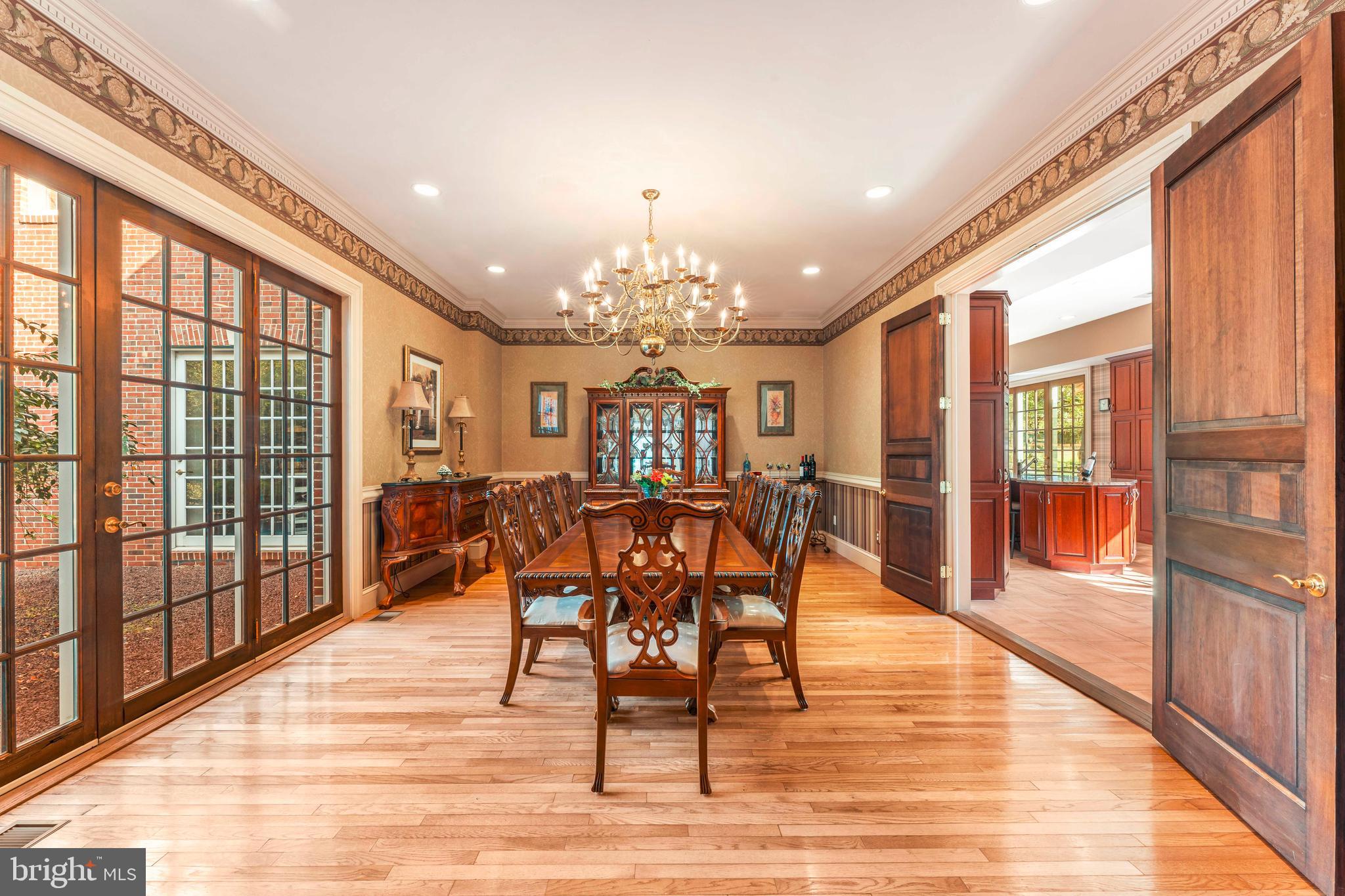 1390 Old Jacksonville Road Ivyland, PA 18974 - Photo 7 of 75 a view of a dining room with furniture a chandelier and wooden floor