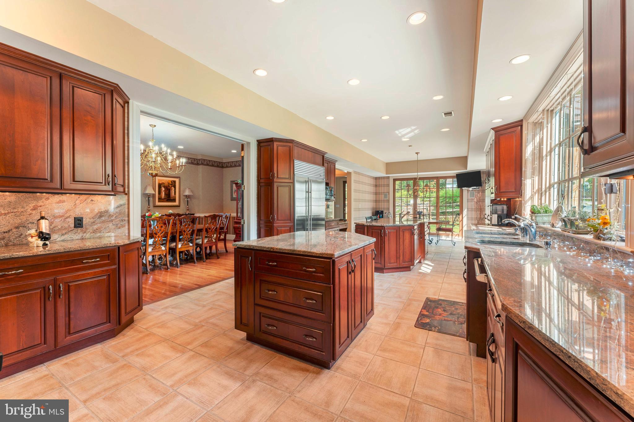 1390 Old Jacksonville Road Ivyland, PA 18974 - Photo 9 of 75 a large kitchen with stainless steel appliances granite countertop a large counter top a stove and a sink