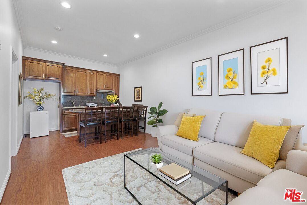 1430 North Dominion Avenue Pasadena, CA 91104 - Photo 16 of 25 a living room with furniture and wooden floor