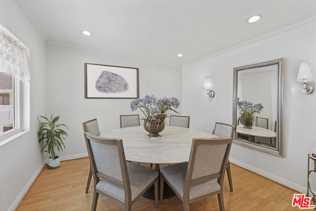 1430 North Dominion Avenue Pasadena, CA 91104 - Photo 3 of 25 a dining room with furniture and wooden floor