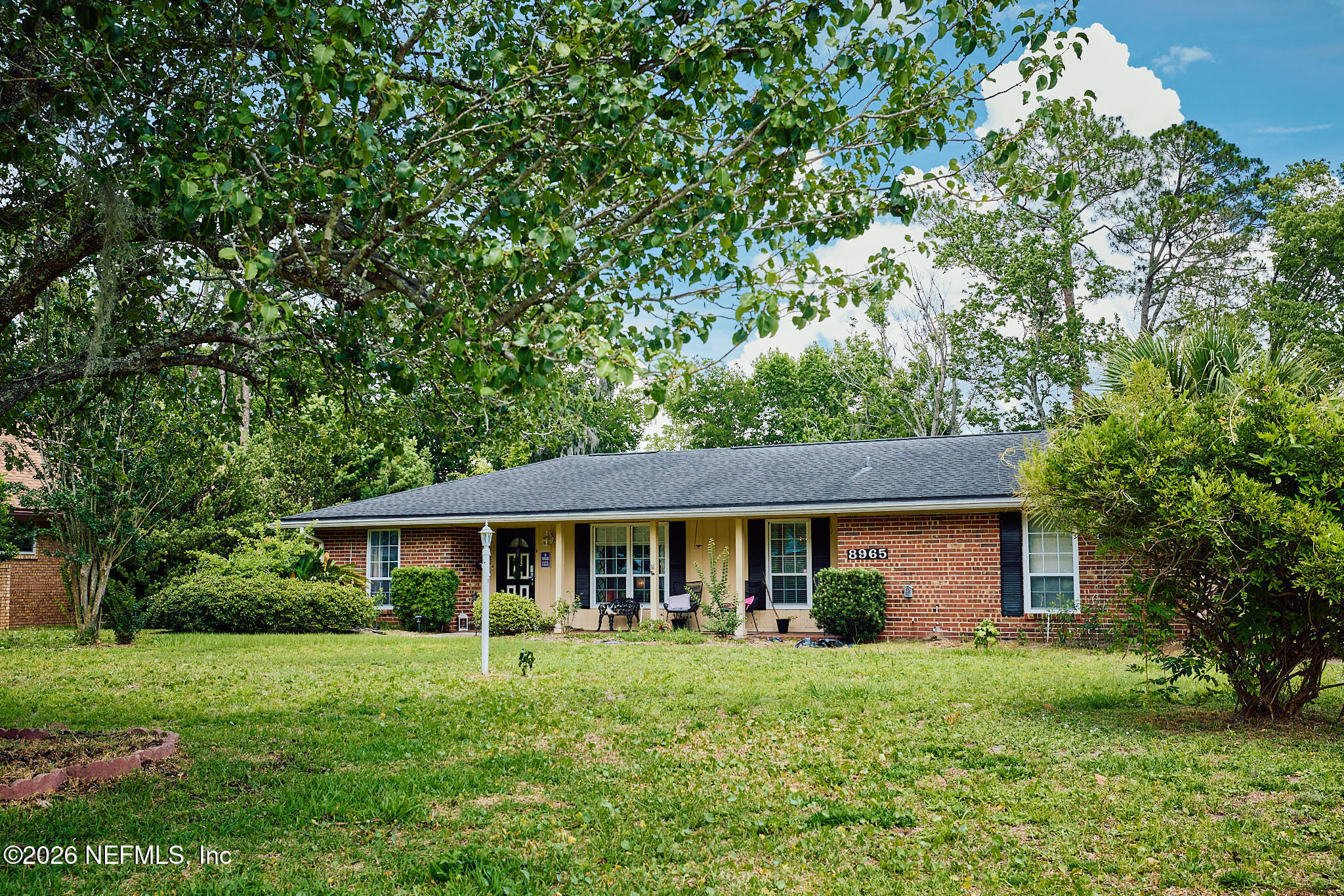 8965 San Rae Road Jacksonville, FL 32257 - Photo 1 of 46 a front view of house with a garden and patio