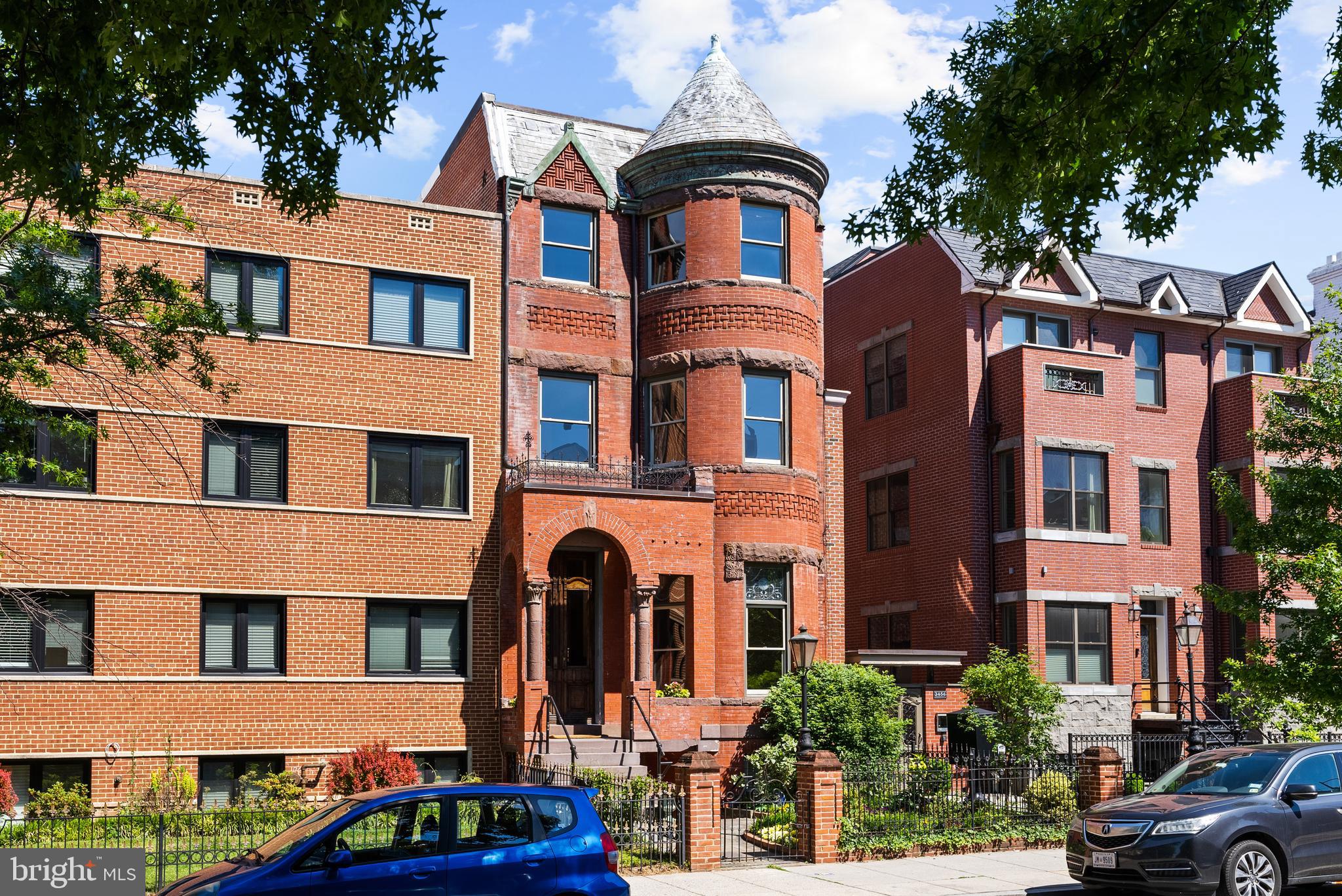 1827 13th Street Northwest Washington, DC 20009 - Photo 14 of 15 a front view of a residential apartment building with a yard
