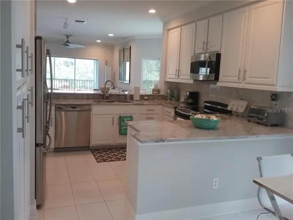 $5,000 | 293 Hidden Bay Drive, Unit 203, Osprey, FL 34229