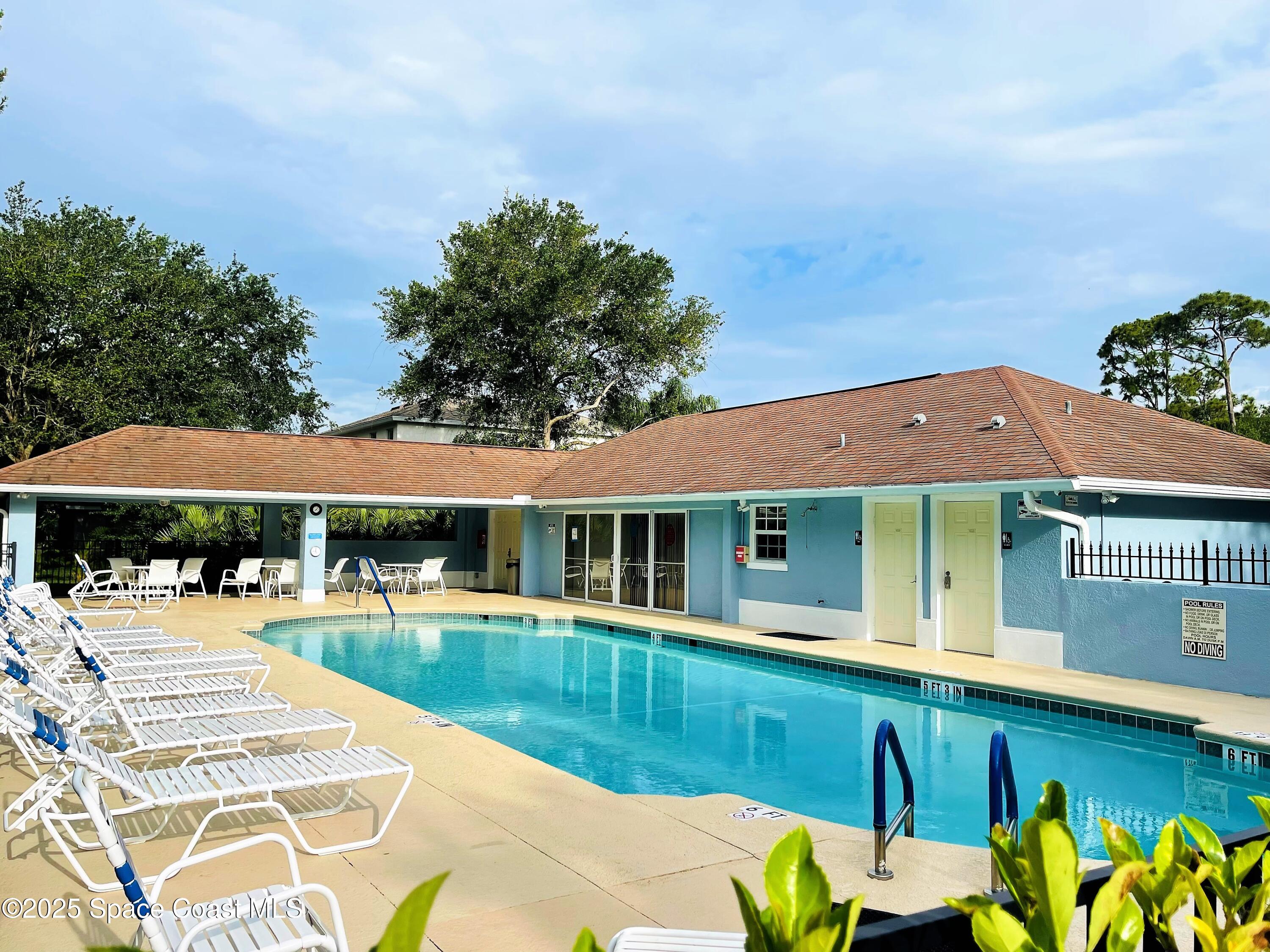 217 Briarcliff Circle Sebastian, FL 32958 - Photo 2 of 36 a view of a patio with swimming pool table and chairs
