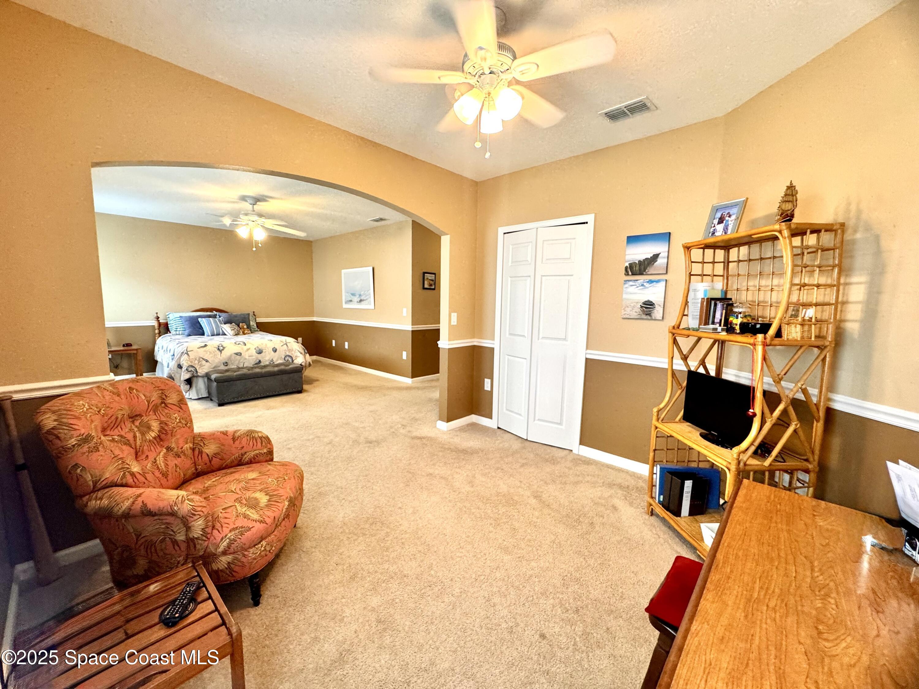 217 Briarcliff Circle Sebastian, FL 32958 - Photo 28 of 36 a view of a livingroom with furniture and a flat screen tv