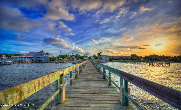217 Briarcliff Circle Sebastian, FL 32958 - Photo 8 of 36 a view of building and lake