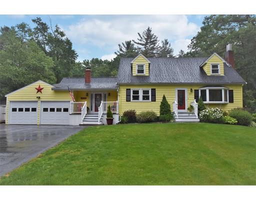 a view of house with a garden