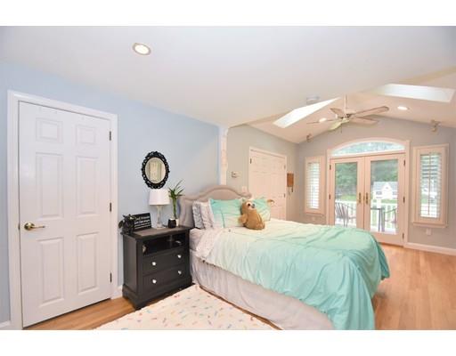 201 Cart Path Road Tewksbury, MA 01876 - Photo 13 of 29 a bedroom with a bed and a closet