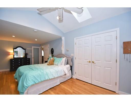 201 Cart Path Road Tewksbury, MA 01876 - Photo 15 of 29 a bedroom with a bed window and wall painting