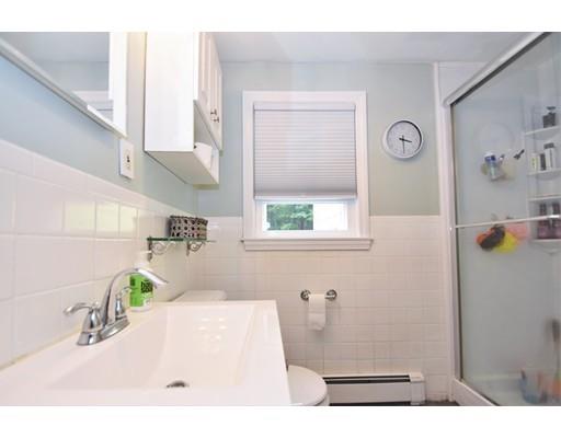 201 Cart Path Road Tewksbury, MA 01876 - Photo 16 of 29 a bathroom with a sink and a mirror