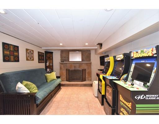 201 Cart Path Road Tewksbury, MA 01876 - Photo 26 of 29 a living room with furniture and a fireplace