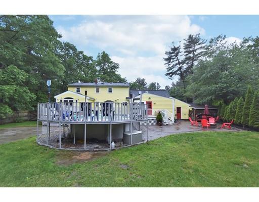 201 Cart Path Road Tewksbury, MA 01876 - Photo 27 of 29 a view of a house with a backyard and a slide