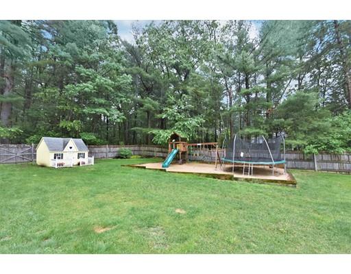 201 Cart Path Road Tewksbury, MA 01876 - Photo 29 of 29 a view of a house with a backyard and a patio