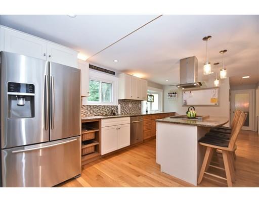 201 Cart Path Road Tewksbury, MA 01876 - Photo 3 of 29 a kitchen with stainless steel appliances granite countertop a refrigerator a stove a sink dishwasher and a refrigerator