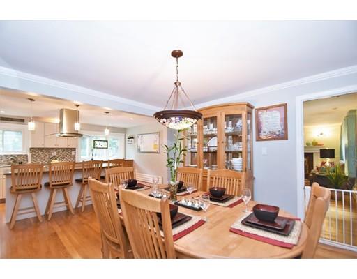 201 Cart Path Road Tewksbury, MA 01876 - Photo 8 of 29 a living room with lots of furniture and a chandelier