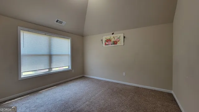 an empty room with an entryway