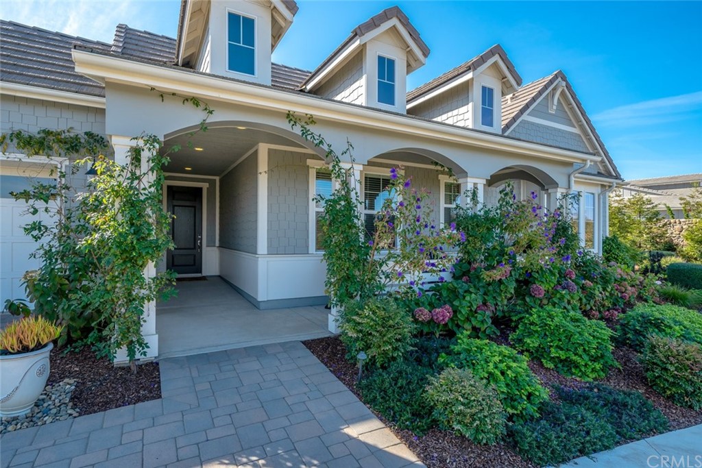 1481 Mesa Road Nipomo, CA 93444 - Photo 3 of 74 front view of a house with potted plants